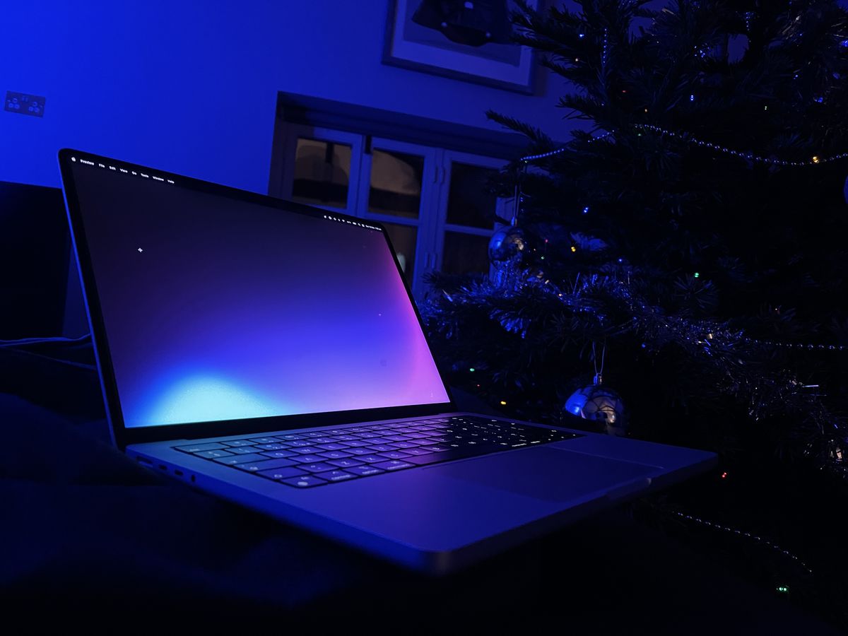 A photo of my new 14" Macbook Pro in silver A photo of my new 14" Macbook Pro in silver
